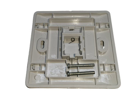 AMP 1 gang faceplate rear view showing mounting screws and inner structure for electrical switches