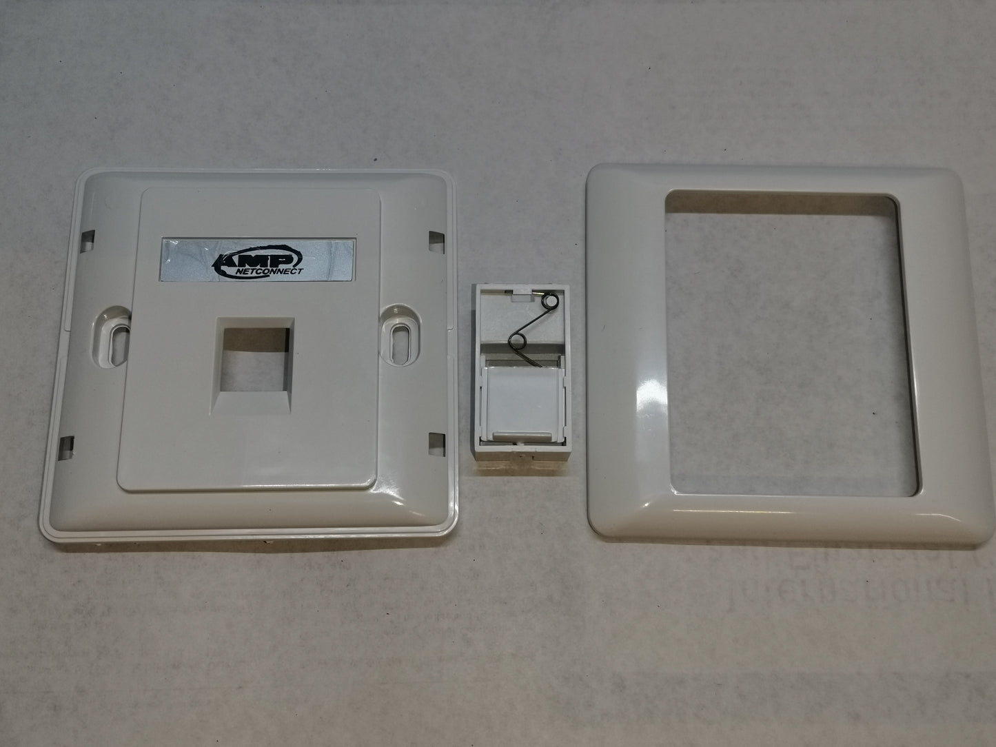 AMP 1 gang faceplate in white with mounting frame and switch component for power points and switches