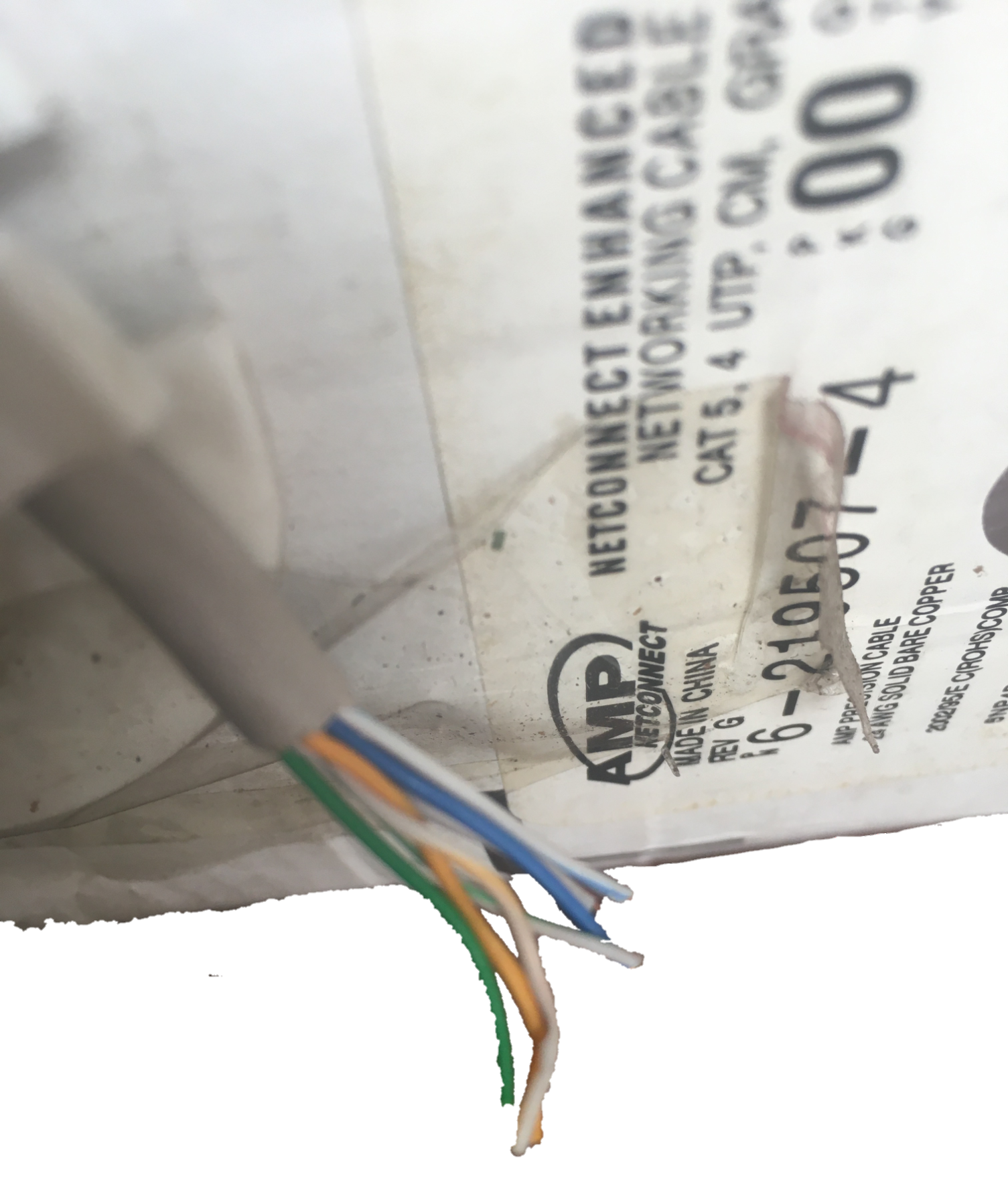 Close-up of AMP LAN Cable Stranded showing exposed twisted wire pairs from network cable