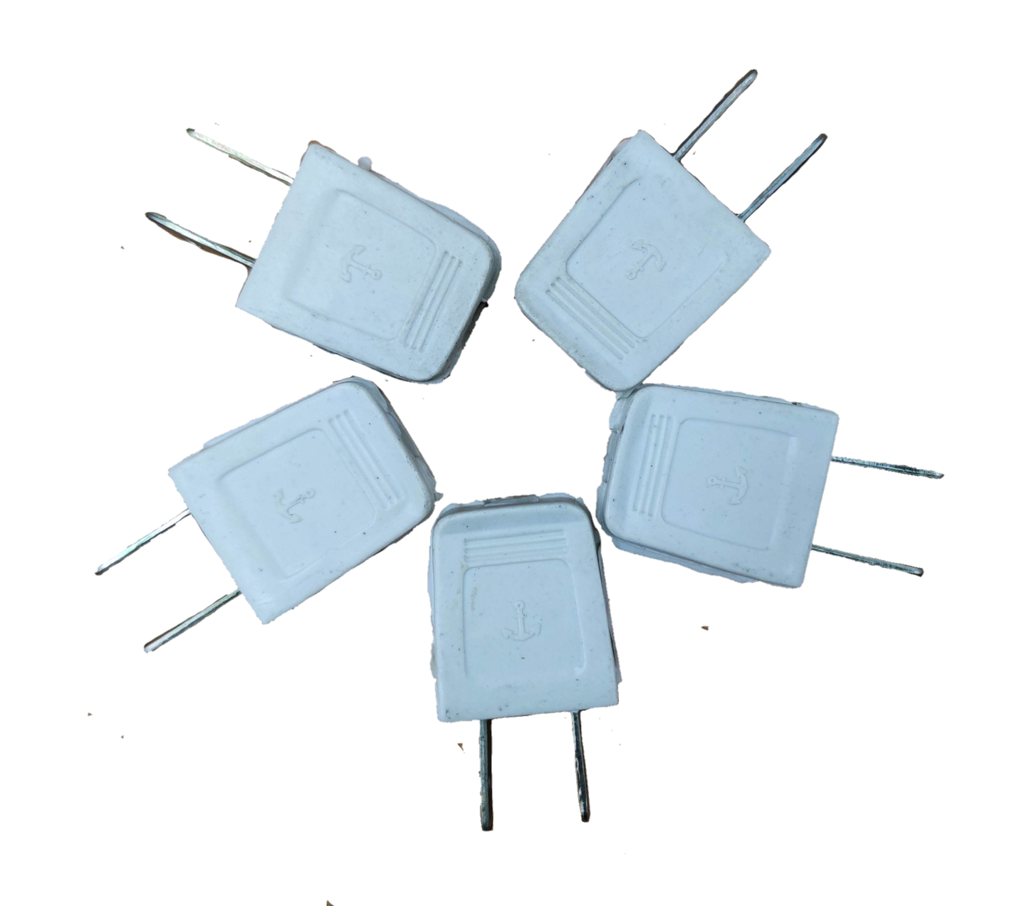 Anchor Plug Plastic 3A 125V white electrical plugs arranged in circular pattern on black background