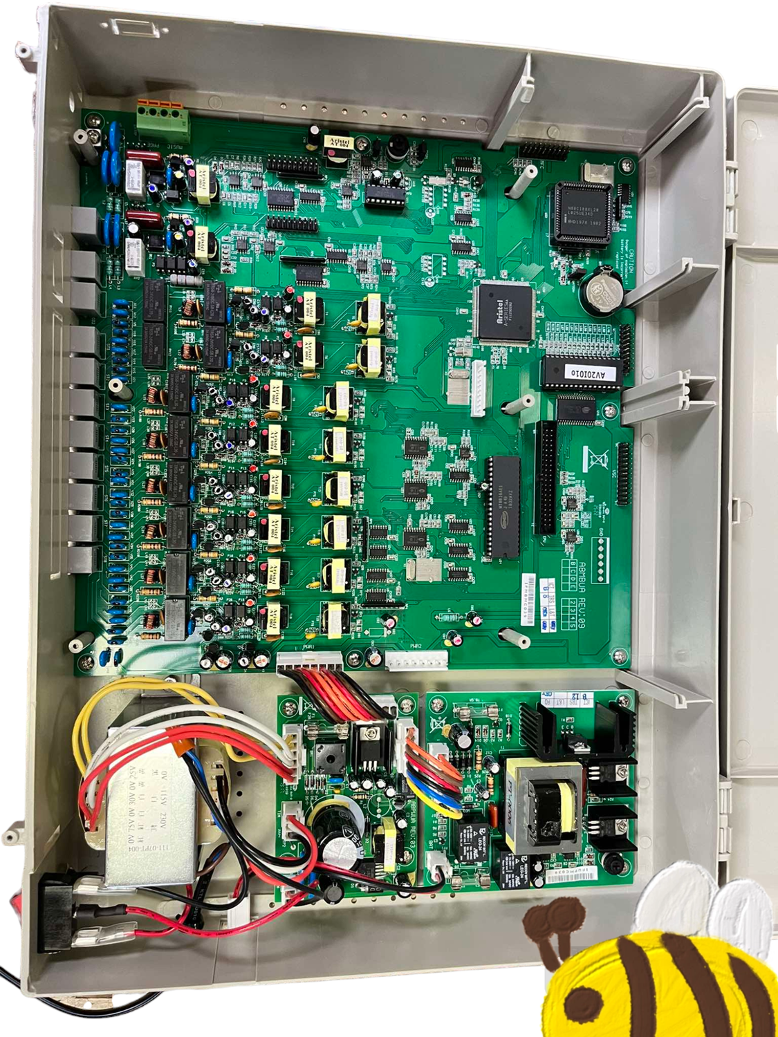 Aristel PABX system for offices showing internal green circuit board with multiple electronic components and wiring