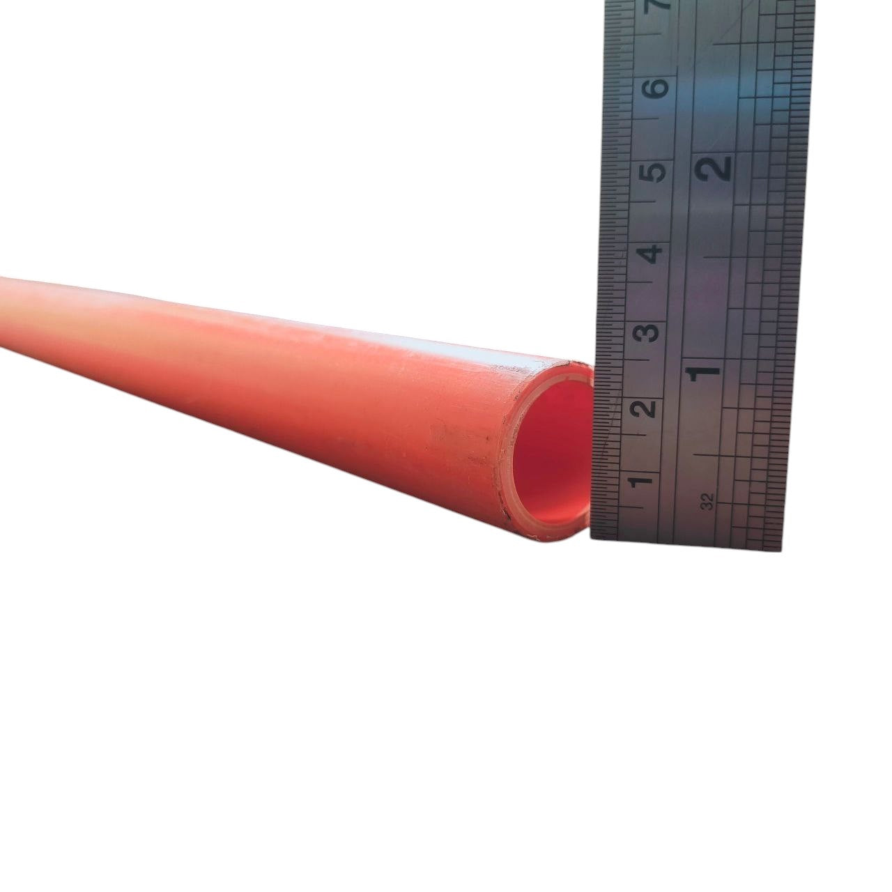 25mm Permaline PVC conduit pipe in orange with a ruler measuring its diameter