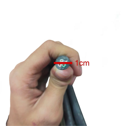 Phelps Dodge AWG 18 Royal Cord Power Cable 4C held in hand, showcasing its diameter and four conductor design