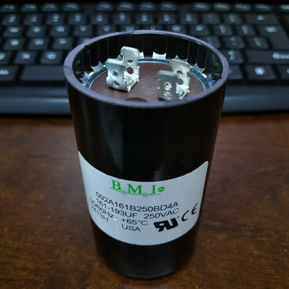 BMI starting capacitor 161-193UF 250V AC with metal terminals and black casing for electrical applications
