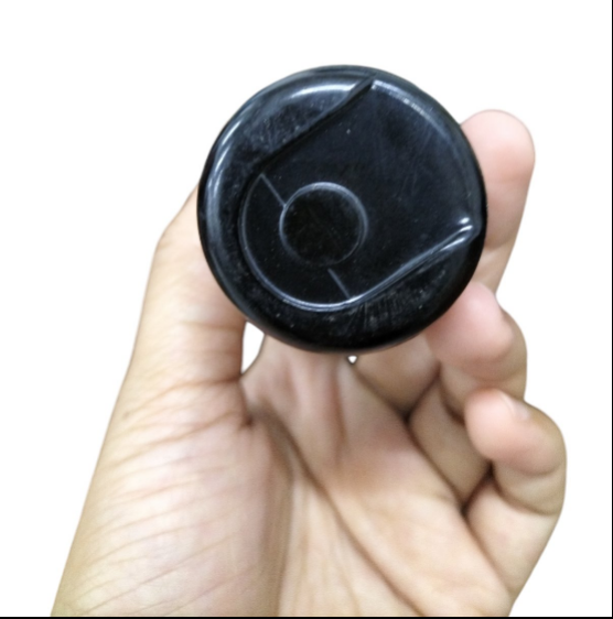 BMI Starting capacitor 460-552uf 250V held in a hand for electrical applications