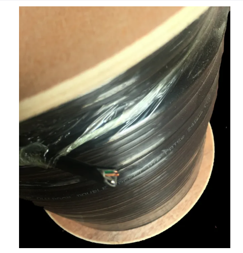 Spool of black outdoor network cable with exposed twisted pairs CAT5e UTP Weatherproof for outdoor Ethernet runs