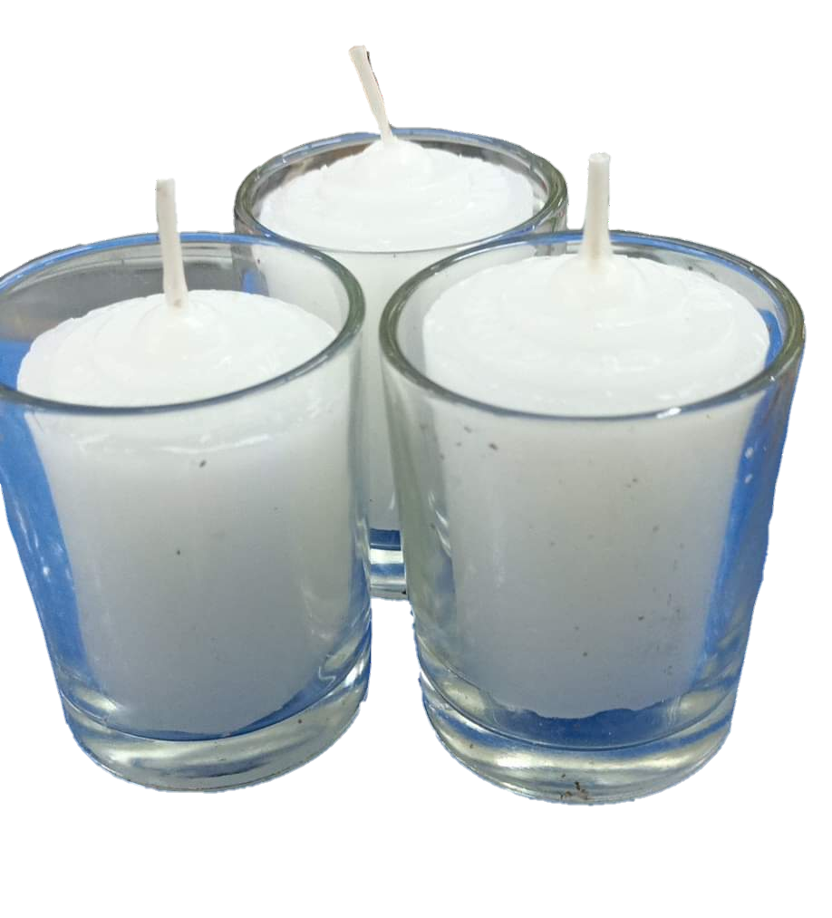 Set of three candle with glass white holders filled with white wax and unlit wicks
