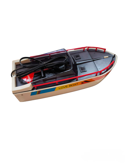 Cassette Rewinder Beta 220V or 110V designed as a boat with black cord and cover