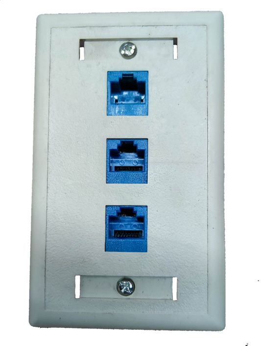 AMP network access points with three blue ports on a white cat 6 ethernet wall outlet plate