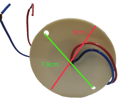 Sub Zero circular blinking light xenon bulb base with red and blue wires on black background