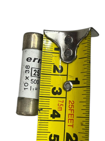 Ceramic Fuse 25A 500V 10x38mm next to yellow measuring tape showing fuse size