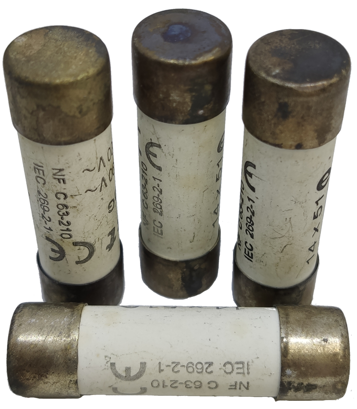 Ceramic Fuse 4A 8x31mm electrical component with metal caps and white ceramic body from China