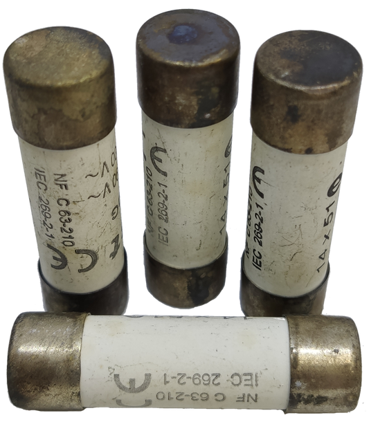 Ceramic Fuse 4A 8x31mm electrical component with metal caps and white ceramic body from China