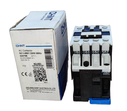 Chint Magnetic Contactor 25A 220V 1NC with white and black housing next to its branded packaging box