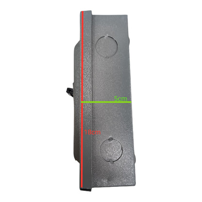 Black rectangular object with measurement markings on a white background