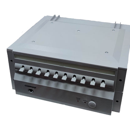 Metallic appliance with control panel on a white background