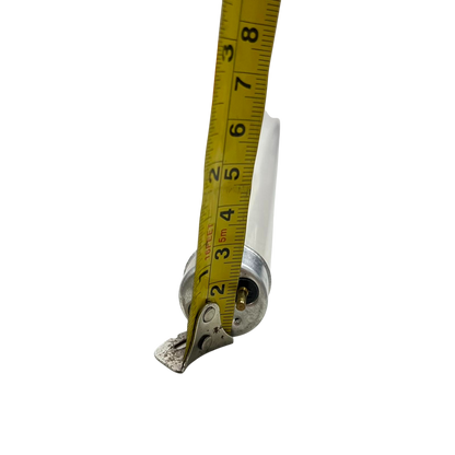10W UVC Fluorescent Tube being measured with a yellow tape measure on a black background