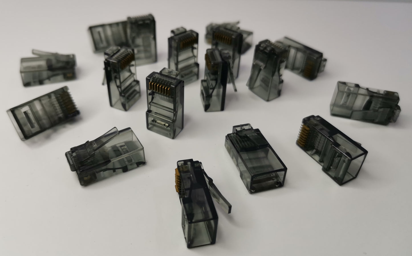 Grippes Denko RJ45 Connector colored for powerline network adapter with transparent housing and gold pins