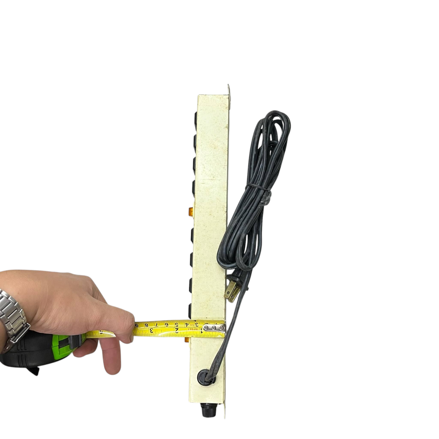 8 gang extension cord 220V power strip with measuring tape showing its width and black cord wrapped