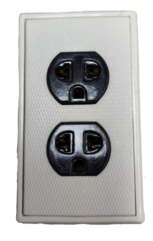 Kopez duplex outlet with ground 10A 250V in black on textured white power point plate