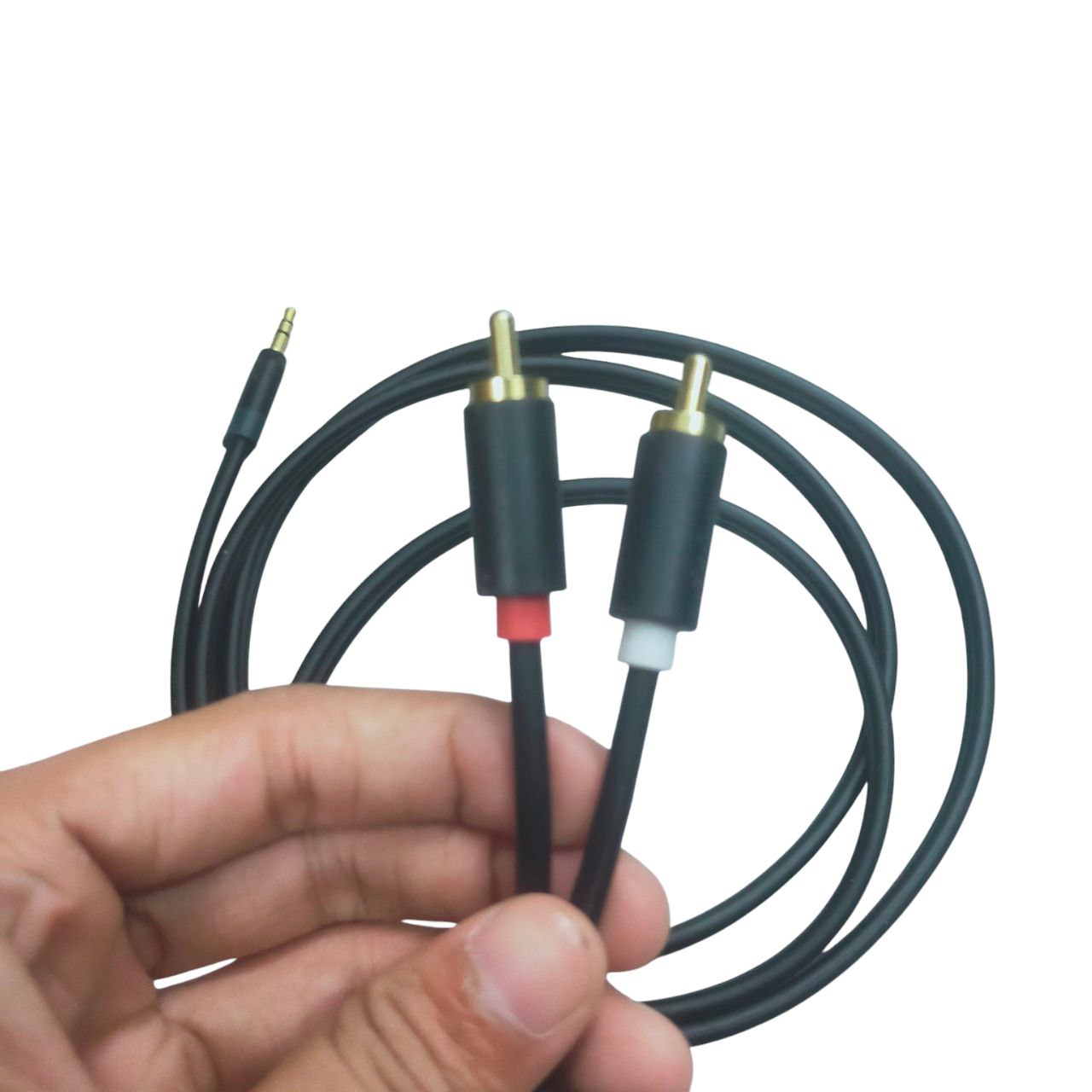 Durable RCA to aux cable in hand, ideal for connecting audio devices with high-quality sound transfer