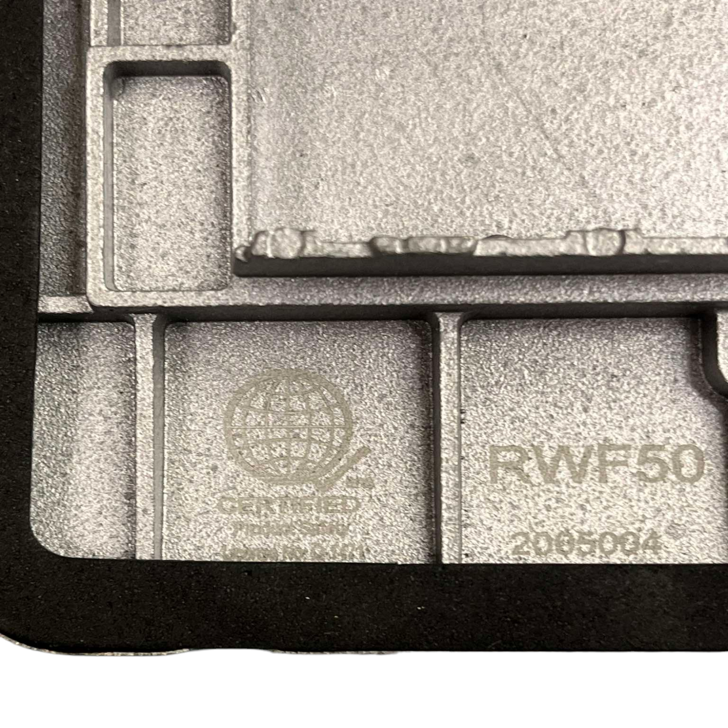 Close-up of Royu Floor Outlet 2 Port USB Outlet 2100mAh with certification markings on metal casing