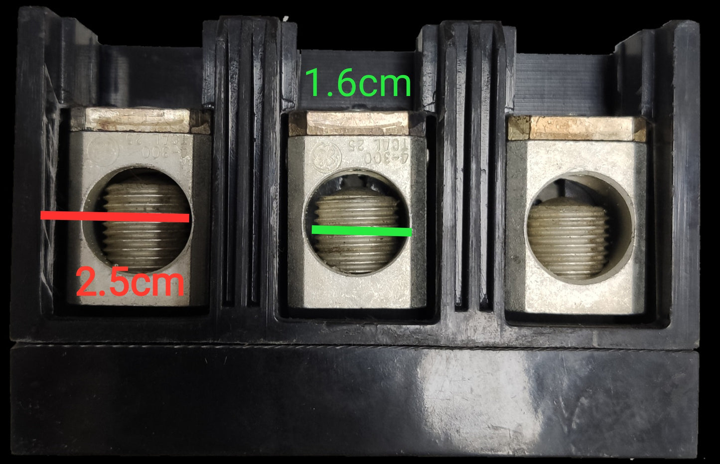 GE 175A 3 Phase 3 Pole Circuit Breaker with three metal connection points and black plastic housing