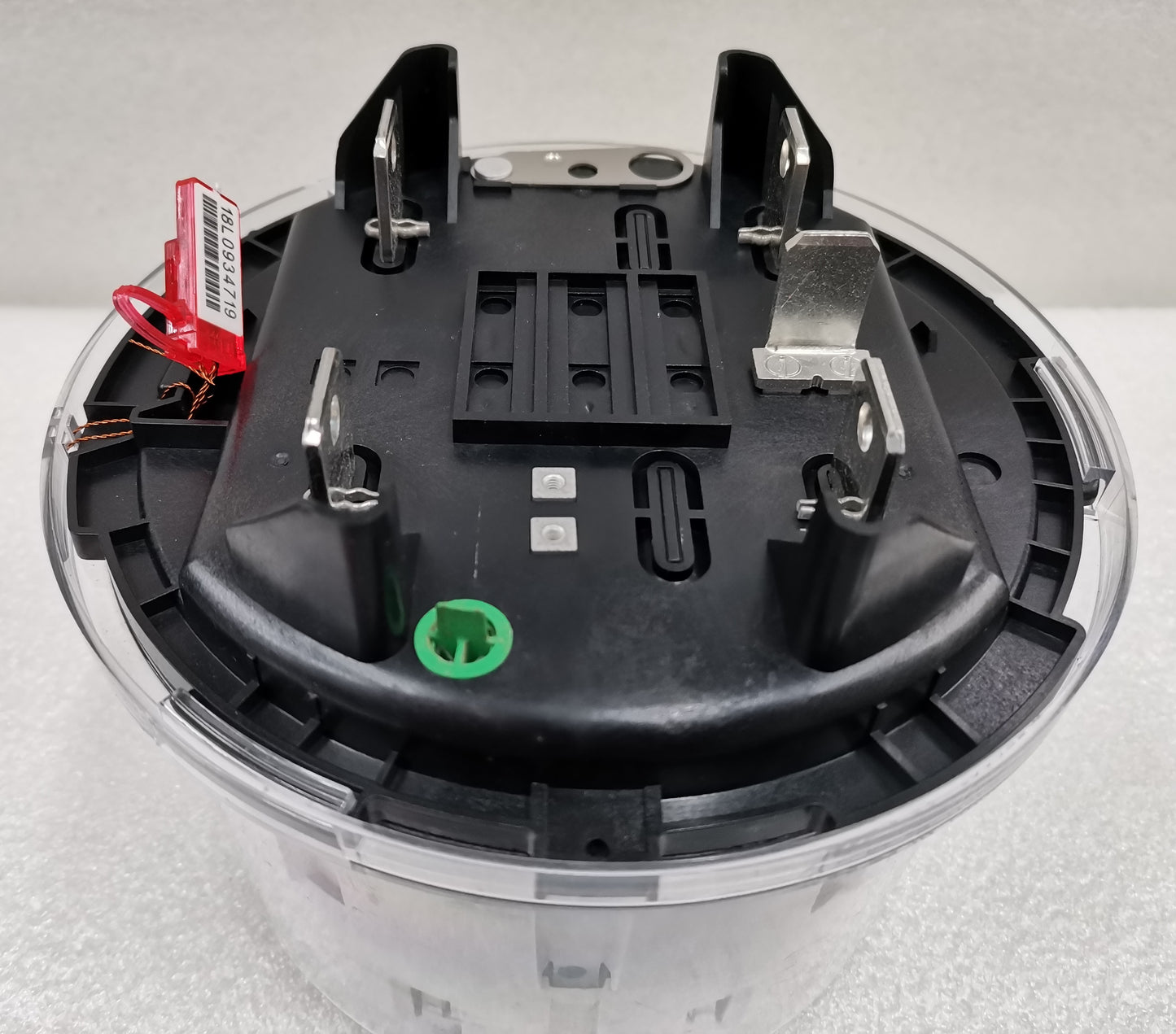 Close-up of Alcara KV2C FM12S KWH Meter base with metal connectors and clear plastic housing