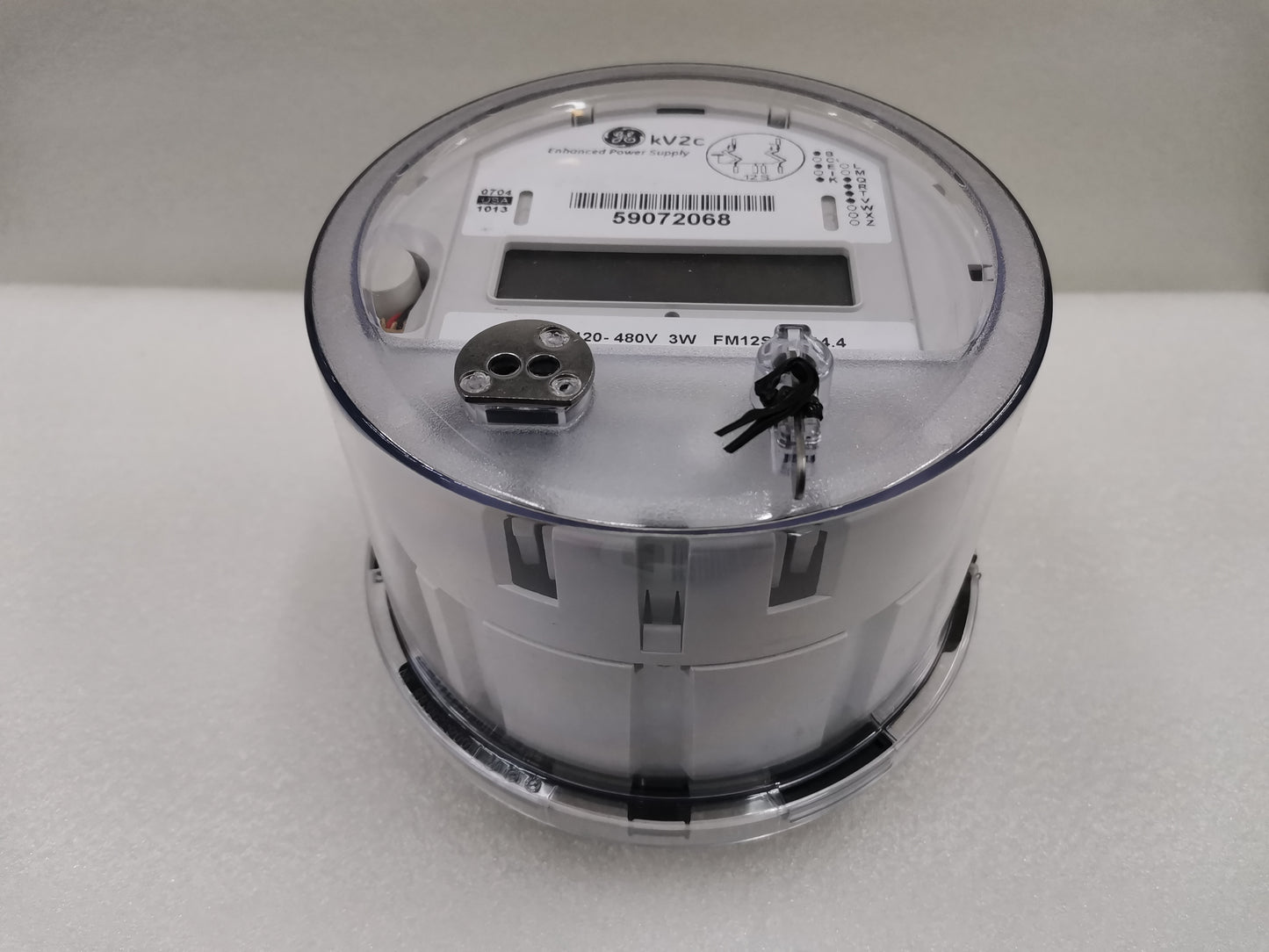 GE and Aclara Alcara KV2C FM12S KWH Meter with clear protective cover for electrical power measurement