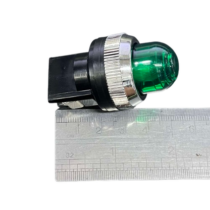 Auspicious Green 25mm Neon Pilot lamp 220V with a chrome ring and black base, shown alongside a ruler for scale