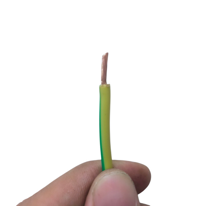 Close-up of hand holding Grounding Cable 2.0mm AWG14 wire with yellow and green insulation