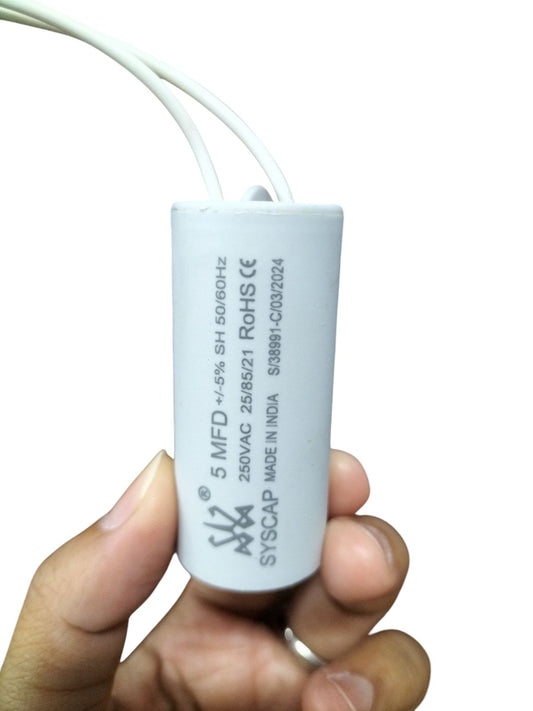 Syscap High Quality 5 MFD 250V Capacitor held by hand for electrical circuitry use