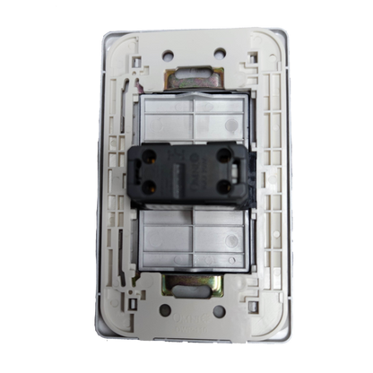 Omni illuminated rocker switch 16A 250V installed in a wall plate with a clean design