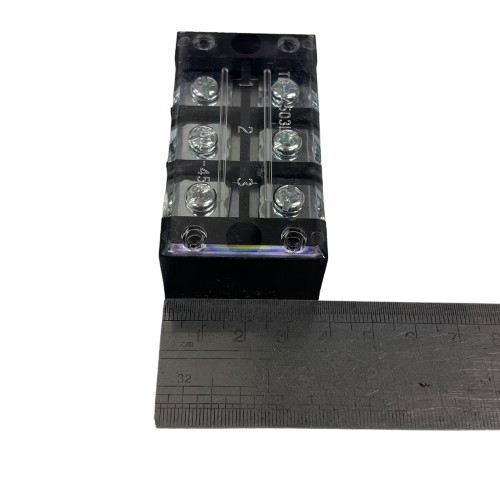 Grippes 45A 3 Pair Terminal Block 600V clear plastic cover metal screw terminals shown next to ruler