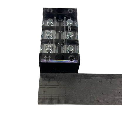 Grippes 45A 3 Pair Terminal Block 600V clear plastic cover metal screw terminals shown next to ruler