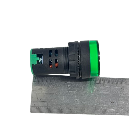 Denko Pilot Light 220v GREEN 22mm industrial indicator with green lens and black housing on ruler