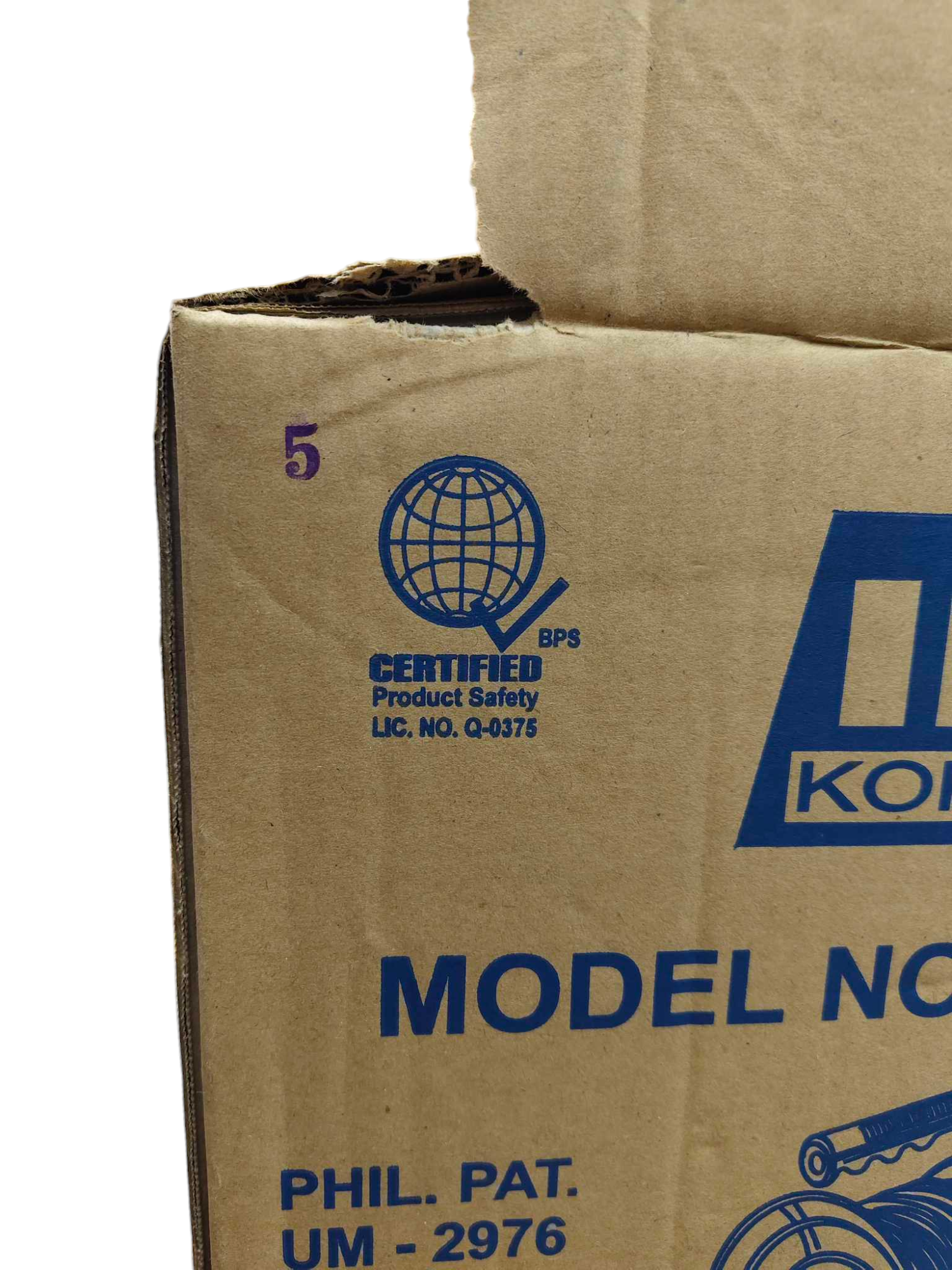 Kopez industrial drum extension cord packaged in brown cardboard box with product safety certifications
