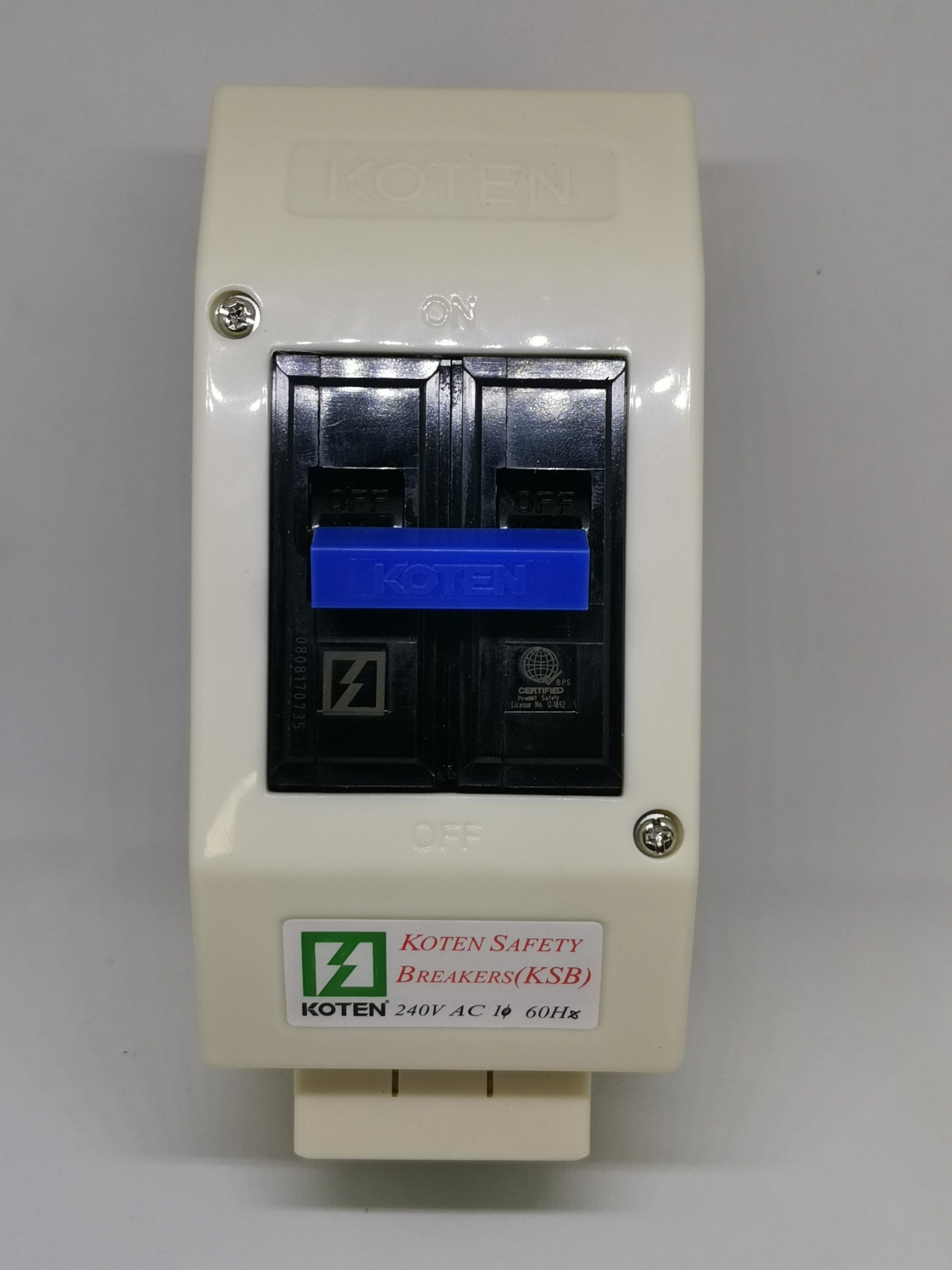 Koten 15A circuit breaker with outlet in white housing for electrical safety and protection