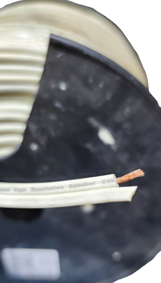 Monster magnetic flux tube speaker cable on a spool with exposed copper wire