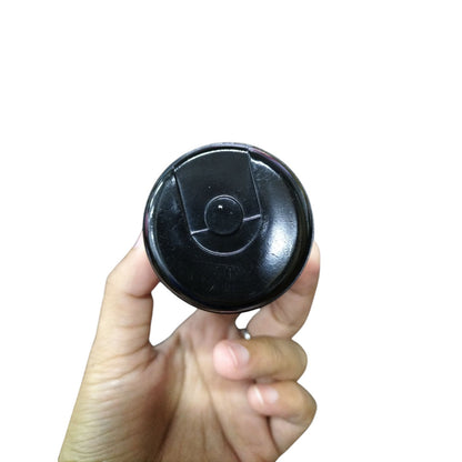 Mallory 161-193MFD 330V AC motor start capacitor held in hand for electrical applications