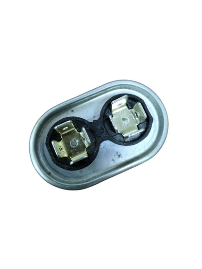 Mallory 440V running capacitor with dual terminals in a compact oval design for electrical applications