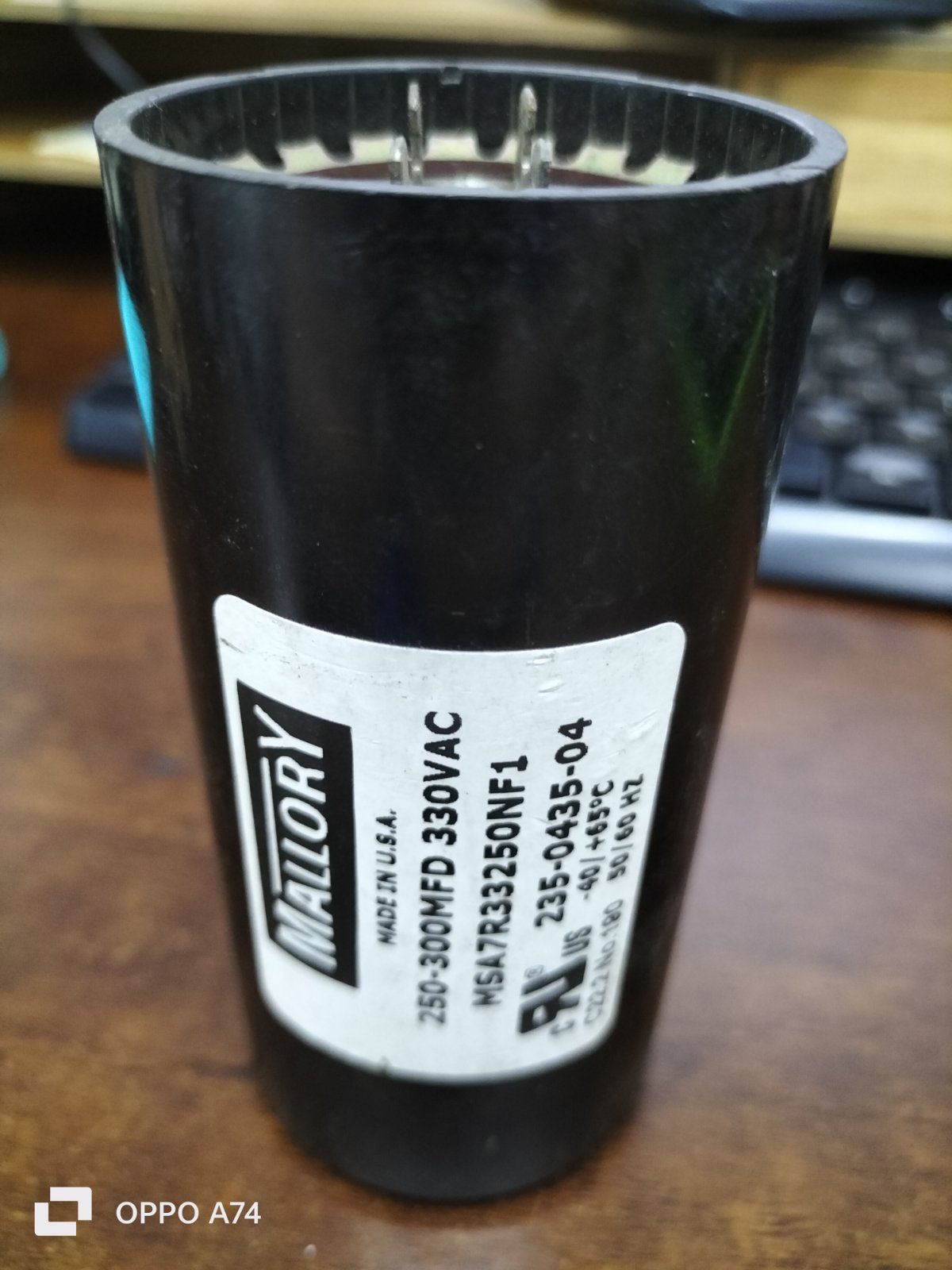 Mallory black electrical Capacitor 250-300 MFD 330 VAC for circuit applications