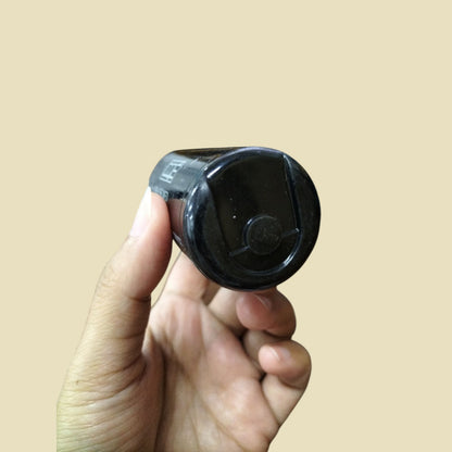 Mallory Motor Capacitor 270-324uF 220V held in hand with a sleek black design