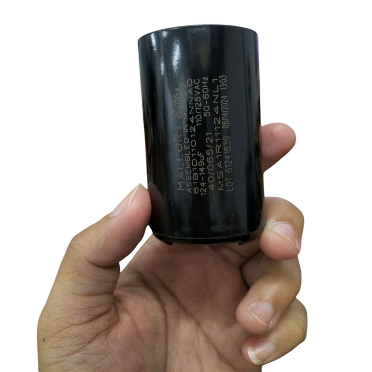 Mallory Motor Capacitor in a sleek black casing for electrical circuit applications