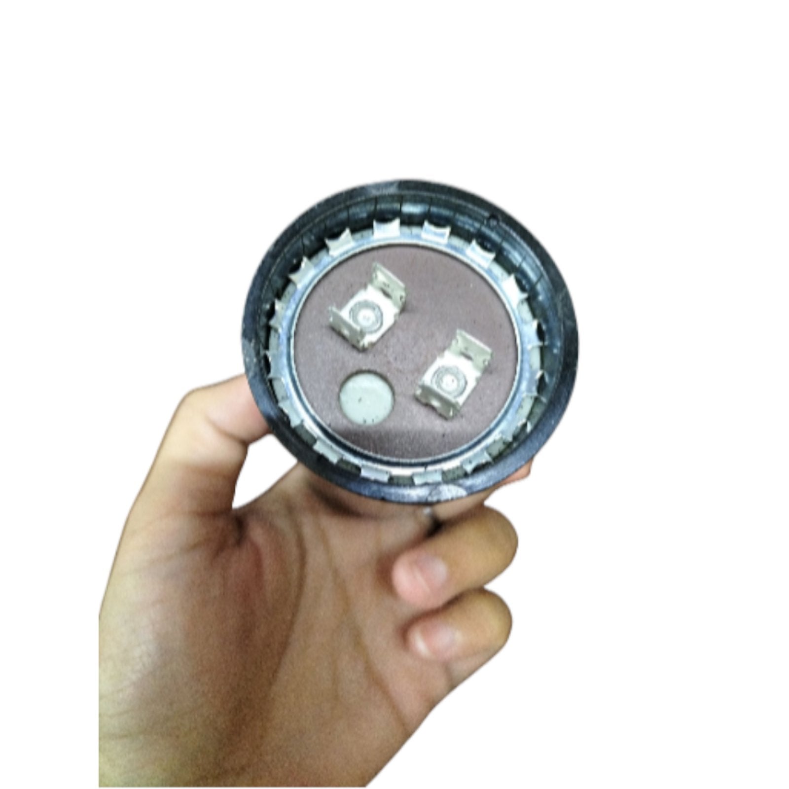 Mallory motor starting capacitor 850-1020UF 125V held in hand showing terminal connections