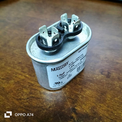 Mallory oil-filled running capacitor 440V AC with metal casing and two terminal connections