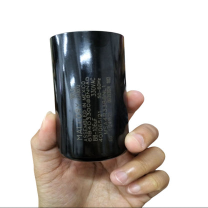 Mallory Starting Capacitor 88 to 106UF 330V in Black Cylinder Held in Hand