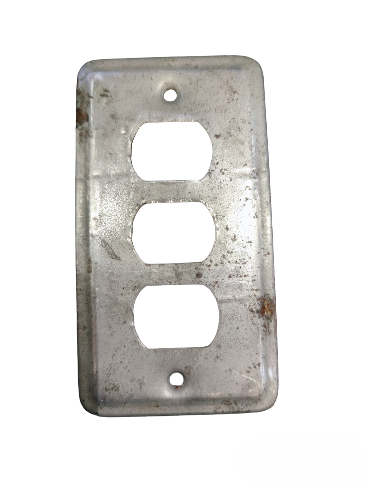 Rusty metal switch cover 3 gang with three rectangular openings for switches or plugs