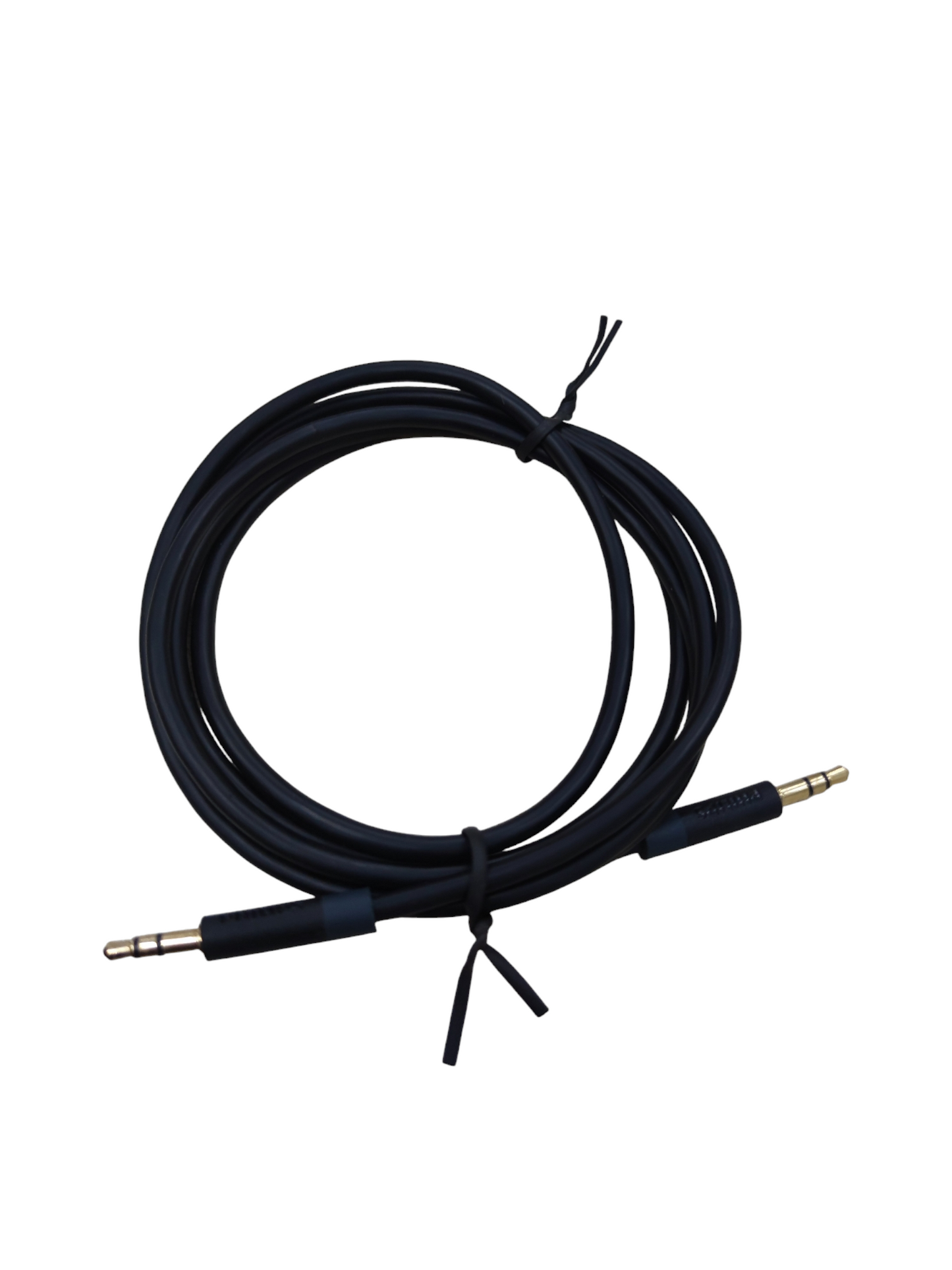 Black 3.5mm audio cable male to male with gold plated connectors coiled and tied for audio devices