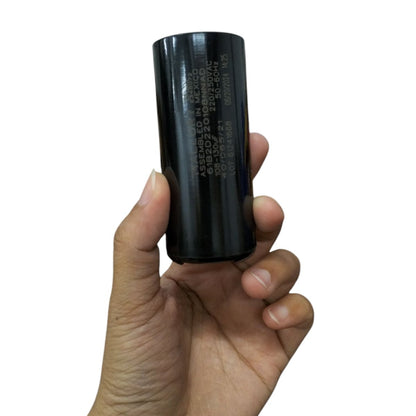 Mallory black motor capacitor showing cylindrical electrical circuitry part